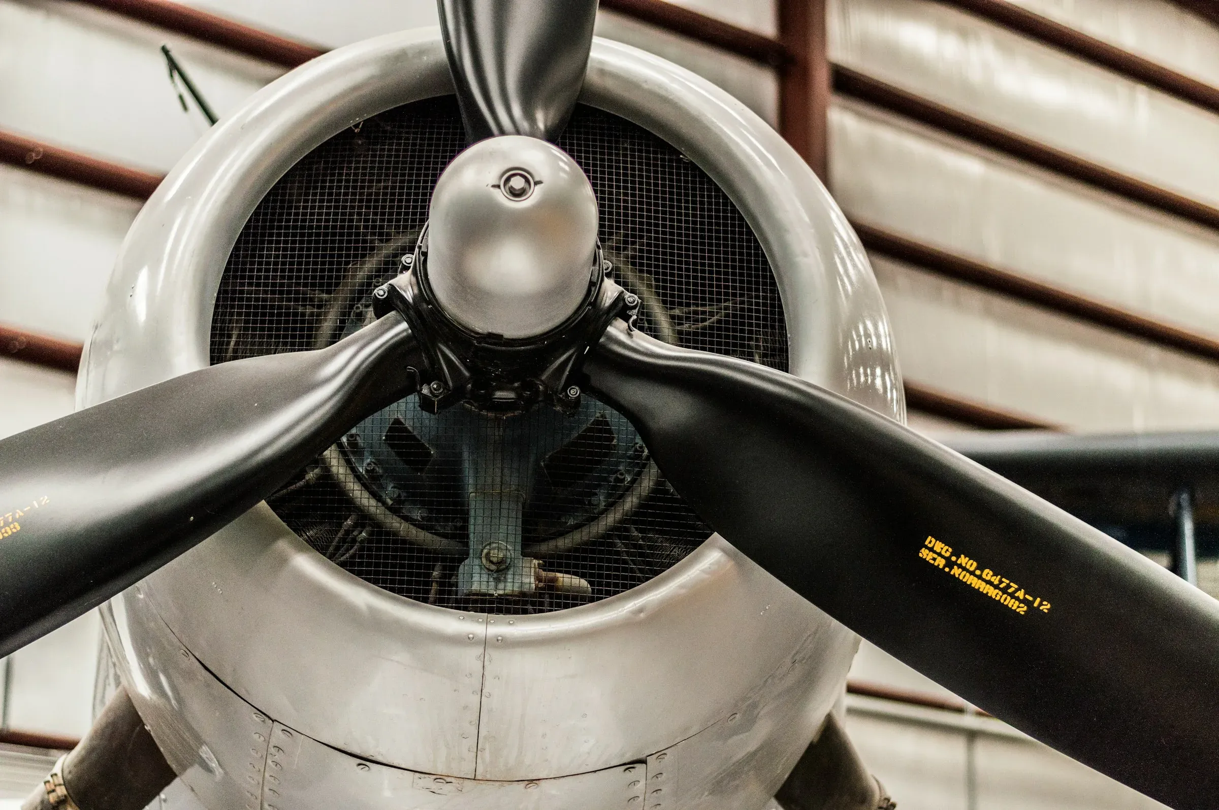 Close-up of an aircraft propeller in a hangar